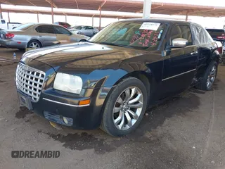 2010 Chrysler 300 Touring with VIN 2C3CA5CV9AH284356, listed as a IAAI auction lot 42124573 with 208,519 mi miles and . Bid and sale history available at DreamBid. Image 2.