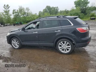 2012 Mazda CX-9 Grand Touring z VIN JM3TB3DA7C0364861, wystawiony jako Copart lot #60199255 z przebiegiem 153 477 mil mil oraz Szkoda całkowita • Salvage title. Historia ofert i sprzedaży dostępna na DreamBid. Obrazek 2.