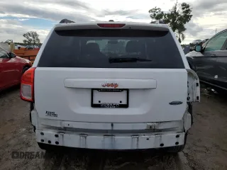 2011 Jeep Compass with VIN 1J4NT1FB8BD138161, listed as a Copart auction lot 73679894 with 199,735 mi miles and Salvage Title. Bid and sale history available at carsss.com. Image 6.