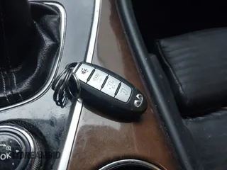 2014 Infiniti Q50 Premium z VIN JN1BV7AR7EM696486, wystawiony jako IAAI lot #41976047 z przebiegiem 145 000 mil mil oraz . Historia ofert i sprzedaży dostępna na DreamBid. Obrazek 10.