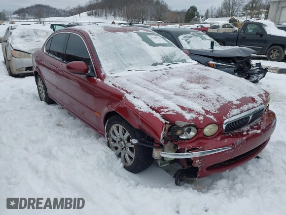 2003 Jaguar X-Type 2.5L Manual z VIN SAJEA51D63XC89273, wystawiony jako IAAI lot #41298544 z przebiegiem 124 400 mil mil oraz . Historia ofert i sprzedaży dostępna na DreamBid. Obrazek 1.