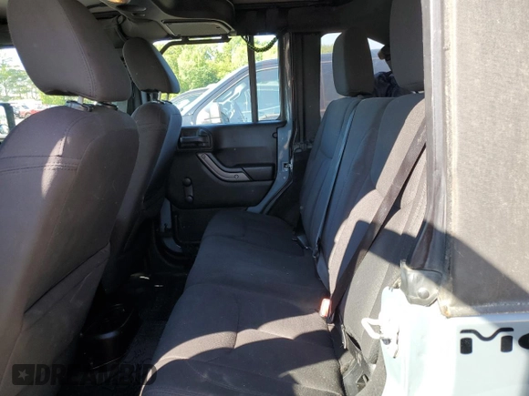 2015 Jeep Wrangler Unlimited Willys Wheeler with VIN 1C4BJWDG5FL609110, listed as a Copart auction lot 56013255 with 153,202 mi miles and Clean Title. Bid and sale history available at DreamBid. Image 11.