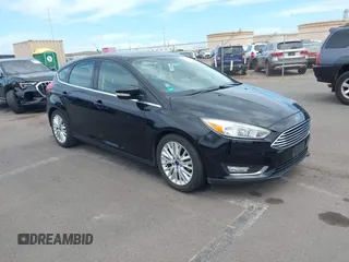 2017 Ford Focus Titanium with VIN 1FADP3N24HL326330, listed as a IAAI auction lot 42594927 with 54,727 mi miles and . Bid and sale history available at DreamBid. Image 1.