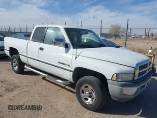 1997 Dodge 1500 with VIN 3B7HF13Z7VG777358, listed as a IAAI auction lot 41555554 with 302,952 mi miles. Bid and sale history available at carsss.com. Image 1.