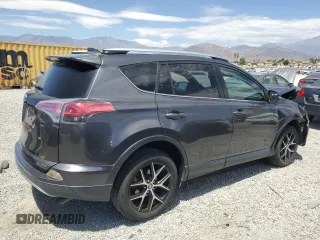 2016 Toyota RAV4 SE with VIN JTMNFREV2GJ072643, listed as a Copart auction lot 63879695 with 104,118 mi miles and Salvage title. Bid and sale history available at DreamBid. Image 3.