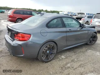 2018 BMW M2 with VIN WBS1J5C58J7B61965, listed as a Copart auction lot 63543004 with 9,663 mi miles and Salvage Title. Bid and sale history available at carsss.com. Image 3.