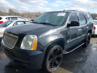 2011 GMC Yukon Denali with VIN 1GKS2EEF6BR257194, listed as a IAAI auction lot 41619864 with 183,057 mi miles. Bid and sale history available at carsss.com. Image 2.