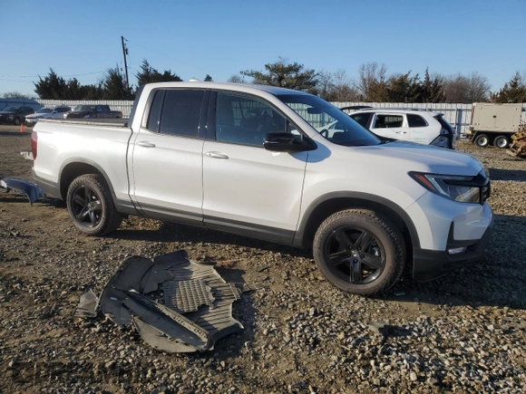 2023 Honda Ridgeline Black Edition with VIN 5FPYK3F82PB055208, listed as a Copart auction lot 87029914 with 33,687 mi miles and Salvage title. Bid and sale history available at DreamBid. Image 4.