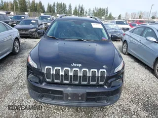 2014 Jeep Cherokee Latitude with VIN 1C4PJMCS0EW169696, listed as a IAAI auction lot 41647691 with 98,919 mi miles. Bid and sale history available at carsss.com. Image 13.