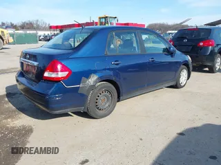 2011 Nissan Versa 1.8 S with VIN 3N1BC1APXBL395928, listed as a IAAI auction lot 41544503 with 229,242 mi miles. Bid and sale history available at carsss.com. Image 4.
