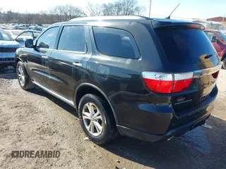 2013 Dodge Durango Crew with VIN 1C4SDHDT3DC553939, listed as a IAAI auction lot 41404491 with 148,505 mi miles and . Bid and sale history available at carsss.com. Image 3.
