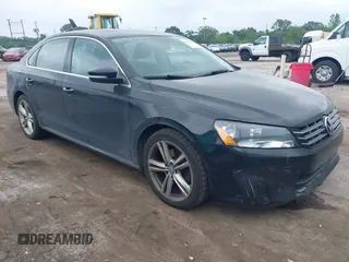 2015 Volkswagen Passat SE z VIN 1VWBV7A32FC034506, wystawiony jako IAAI lot #42448158 z przebiegiem 312 926 mil mil oraz . Historia ofert i sprzedaży dostępna na DreamBid. Obrazek 1.