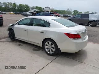 2013 Buick LaCrosse Leather with VIN 1G4GC5E35DF329300, listed as a IAAI auction lot 42313323 with 108,322 mi miles and . Bid and sale history available at DreamBid. Image 3.