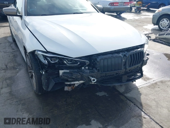 2022 BMW 4 Series M440i with VIN WBA53AT02NCJ20674, listed as a IAAI auction lot 41200398 with 28,235 mi miles and . Bid and sale history available at DreamBid. Image 6.