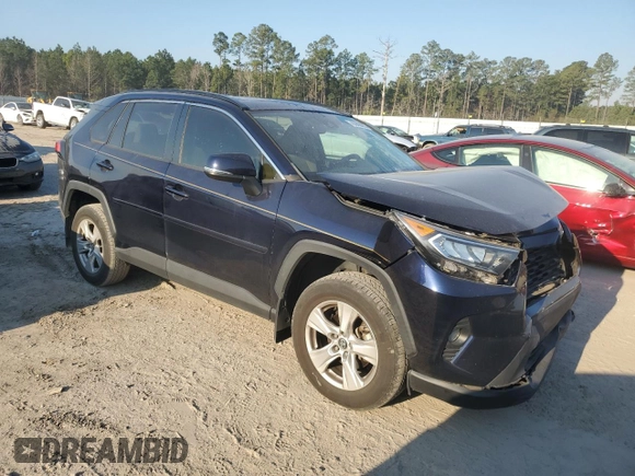 2019 Toyota RAV4 XLE with VIN 2T3W1RFV3KW014147, listed as a Copart auction lot 46943675 with 70,850 mi miles and Salvage Title. Bid and sale history available at DreamBid. Image 4.