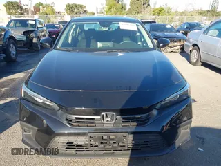 2023 Honda Civic Sedan EX with VIN 2HGFE1F75PH324493, listed as a IAAI auction lot 41692213 with 14,026 mi miles. Bid and sale history available at carsss.com. Image 12.