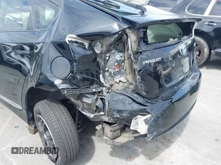 2012 Toyota Prius One z VIN JTDKN3DU2C5495575, wystawiony jako IAAI lot #41905961 z przebiegiem 97 186 mil mil oraz . Historia ofert i sprzedaży dostępna na DreamBid. Obrazek 6.