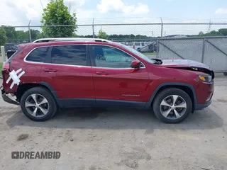 2019 Jeep Cherokee Limited with VIN 1C4PJMDXXKD323087, listed as a IAAI auction lot 42471210 with 57,839 mi miles and . Bid and sale history available at DreamBid. Image 13.