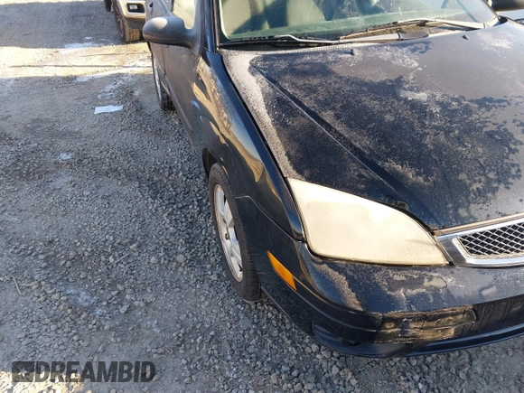 2006 Ford Focus S z VIN 1FAHP37N46W256803, wystawiony jako IAAI lot #41321856 z przebiegiem 99 657 mil mil oraz . Historia ofert i sprzedaży dostępna na DreamBid. Obrazek 6.