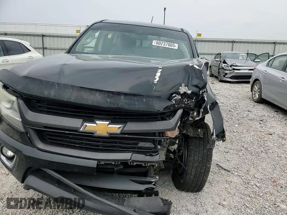 2015 Chevrolet Colorado 2WD Z71 with VIN 1GCGSCE35F1261995, listed as a Copart auction lot 60237005 with 173,319 mi miles and Salvage title. Bid and sale history available at DreamBid. Image 14.