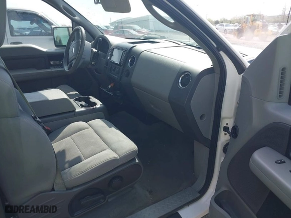 2004 Ford F-150 XL with VIN 1FTPX12584NA31496, listed as a IAAI auction lot 41869988 with 254,852 mi miles. Bid and sale history available at carsss.com. Image 5.