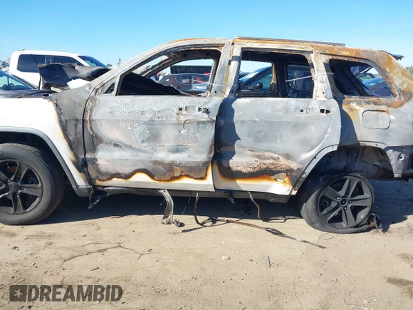 2011 Jeep Grand Cherokee Laredo with VIN 1J4RS4GG2BC618072, listed as a IAAI auction lot 38619850 with Not Provided miles and . Bid and sale history available at DreamBid. Image 13.