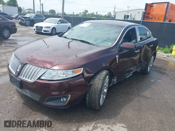 2009 Lincoln MKS with VIN 1LNHM93R69G628697, listed as a IAAI auction lot 39338358 with 125,585 mi miles and . Bid and sale history available at DreamBid. Image 2.