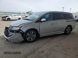 2014 Honda Odyssey Touring with VIN 5FNRL5H92EB109809, listed as a Copart auction lot 51438645 with 155,872 mi miles and Salvage Title. Bid and sale history available at DreamBid. Image 1.