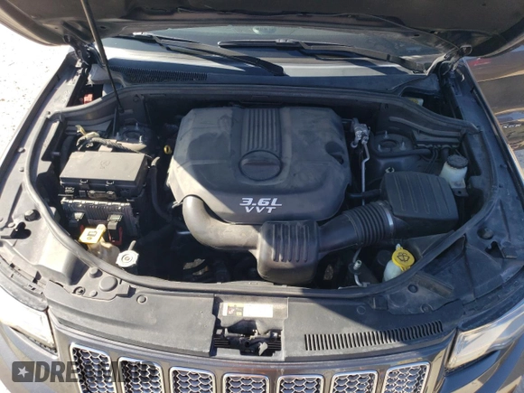 2014 Jeep Grand Cherokee Summit with VIN 1C4RJEJGXEC192532, listed as a Copart auction lot 86210124 with 72,401 mi miles and Salvage title. Bid and sale history available at DreamBid. Image 12.