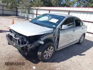 2021 Kia Rio LX with VIN 3KPA24AD8ME403664, listed as a IAAI auction lot 41675554 with 37,999 mi miles. Bid and sale history available at carsss.com. Image 2.