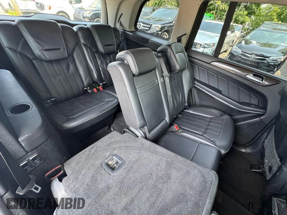 2014 Mercedes-Benz GL 450 with VIN 4JGDF7CEXEA391199, listed as a Copart auction lot 65090185 with 161,997 mi miles and Clean title. Bid and sale history available at DreamBid. Image 6.