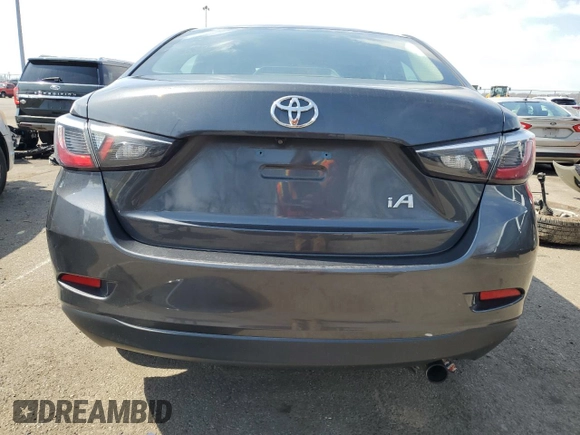 2018 Toyota Yaris with VIN 3MYDLBYV1JY318108, listed as a Copart auction lot 51038825 with 75,816 mi miles and Salvage Title. Bid and sale history available at DreamBid. Image 6.