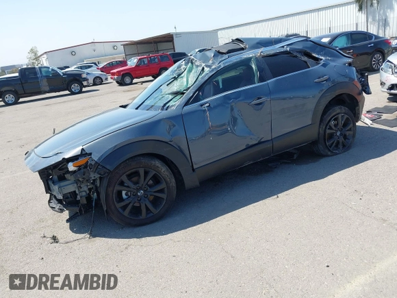 2024 Mazda CX-30 S Preferred z VIN 3MVDMBCMXRM640631, wystawiony jako IAAI lot #41900958 z przebiegiem 10 332 mil mil oraz . Historia ofert i sprzedaży dostępna na DreamBid. Obrazek 17.