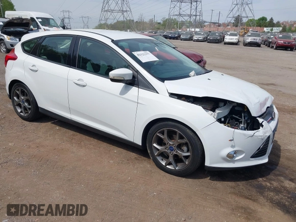 2014 Ford Focus SE with VIN 1FADP3K25EL251024, listed as a IAAI auction lot 42123157 with 74,311 mi miles and . Bid and sale history available at carsss.com. Image 1.
