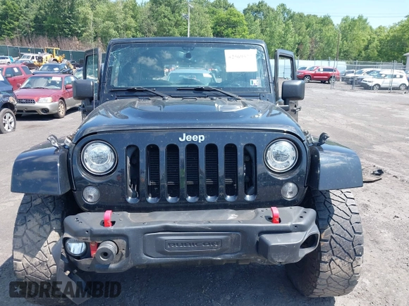 2017 Jeep Wrangler Unlimited Rubicon Recon with VIN 1C4BJWFG7HL525709, listed as a IAAI auction lot 42569577 with 119,560 mi miles and . Bid and sale history available at DreamBid. Image 12.