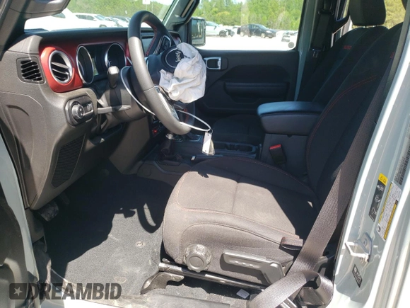 2023 Jeep Gladiator Rubicon с VIN 1C6JJTBG2PL542178, выставлен на аукционе Copart как лот 54684915 с пробегом 24 687 миль миль и Списание • Salvage title. История ставок и продаж доступна на DreamBid. Изображение 7.