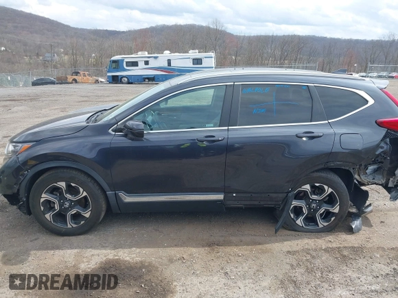 2019 Honda CR-V Touring with VIN 2HKRW2H9XKH636354, listed as a IAAI auction lot 41902615 with 66,781 mi miles and . Bid and sale history available at DreamBid. Image 14.