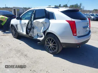 2013 Cadillac SRX Performance Collection with VIN 3GYFNDE33DS637155, listed as a IAAI auction lot 41977706 with 140,668 mi miles and . Bid and sale history available at DreamBid. Image 3.
