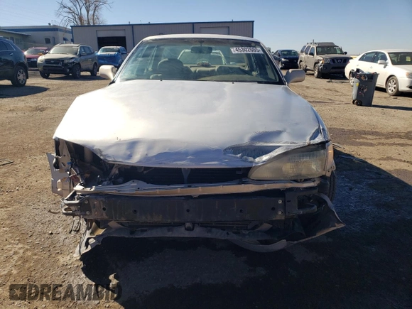 1996 Toyota Camry DX with VIN 4T1BG12K0TU744733, listed as a Copart auction lot 45302005 with 136,736 mi miles and Salvage Title. Bid and sale history available at carsss.com. Image 5.