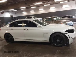 2014 BMW 5 Series 528i xDrive with VIN WBA5A7C57ED612230, listed as a IAAI auction lot 41586318 with 148,676 mi miles and . Bid and sale history available at DreamBid. Image 13.