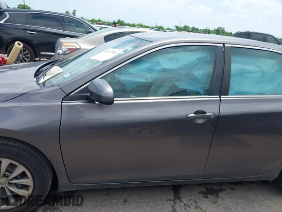 2015 Toyota Camry XLE with VIN 4T4BF1FK1FR446697, listed as a IAAI auction lot 42077763 with 119,278 mi miles and . Bid and sale history available at DreamBid. Image 14.