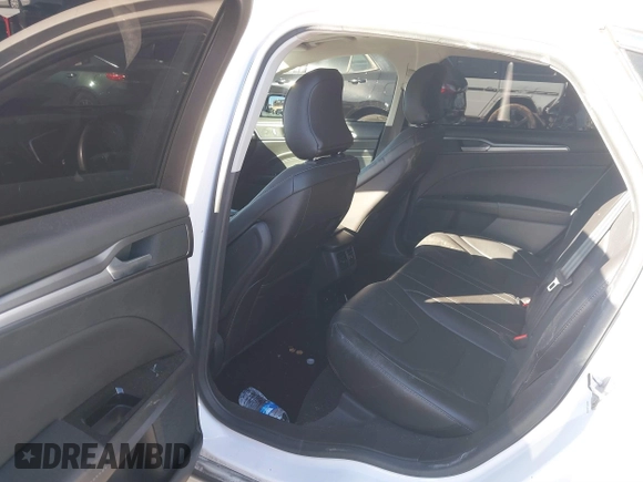 2016 Ford Fusion Titanium Hybrid with VIN 3FA6P0RU1GR259947, listed as a IAAI auction lot 41695377 with 97,605 mi miles. Bid and sale history available at carsss.com. Image 21.