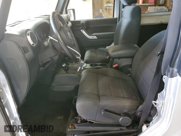 2012 Jeep Wrangler Arctic z VIN 1C4GJWBG2CL237343, wystawiony jako Copart lot #64674015 z przebiegiem 72 750 mil mil oraz Szkoda całkowita • Salvage title. Historia ofert i sprzedaży dostępna na DreamBid. Obrazek 7.