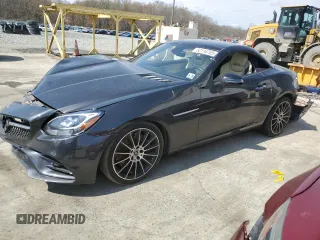 2020 Mercedes-Benz SLC 300 z VIN WDDPK3JA1LF167573, wystawiony jako Copart lot #52116765 z przebiegiem Nie podano mil oraz Szkody całkowita. Historia ofert i sprzedaży dostępna na DreamBid. Obrazek 1.