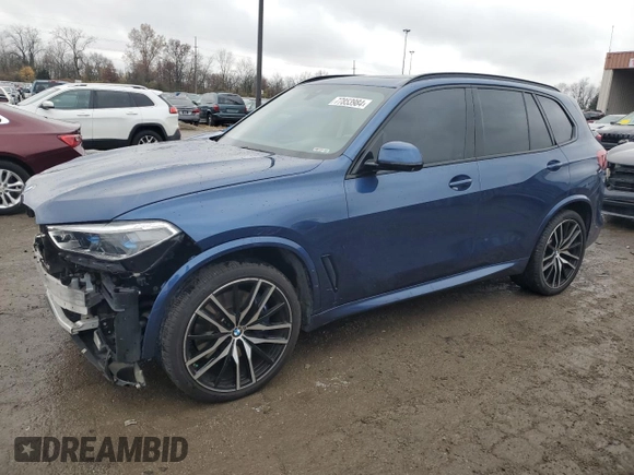 2020 BMW X5 M50i with VIN 5UXJU4C07LLE46002, listed as a Copart auction lot 77853984 with 74,098 mi miles and Salvage Title. Bid and sale history available at DreamBid. Image 1.