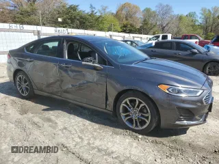 2020 Ford Fusion SEL z VIN 3FA6P0CD7LR196193, wystawiony jako Copart lot #53254465 z przebiegiem 79 944 mil mil oraz Szkoda całkowita • Salvage title. Historia ofert i sprzedaży dostępna na DreamBid. Obrazek 4.