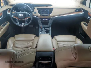 2017 Cadillac XT5 Platinum AWD с VIN 1GYKNFRS0HZ292722, выставлен на аукционе Copart как лот 50487525 с пробегом 101 930 миль миль и Чистый • Clean title. История ставок и продаж доступна на DreamBid. Изображение 8.