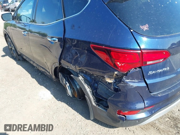 2018 Hyundai Santa Fe Ultimate with VIN 5XYZWDLA3JG571432, listed as a IAAI auction lot 42395245 with 69,330 mi miles and . Bid and sale history available at DreamBid. Image 6.