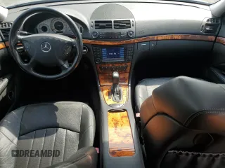2005 Mercedes-Benz E-Class 5.5L AMG with VIN WDBUF76J15A768563, listed as a Copart auction lot 54874585 with 108,952 mi miles and Salvage Title. Bid and sale history available at carsss.com. Image 9.