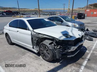 2019 BMW 5 Series 530e with VIN WBAJA9C53KB391999, listed as a IAAI auction lot 42311824 with 79,196 mi miles and . Bid and sale history available at DreamBid. Image 1.